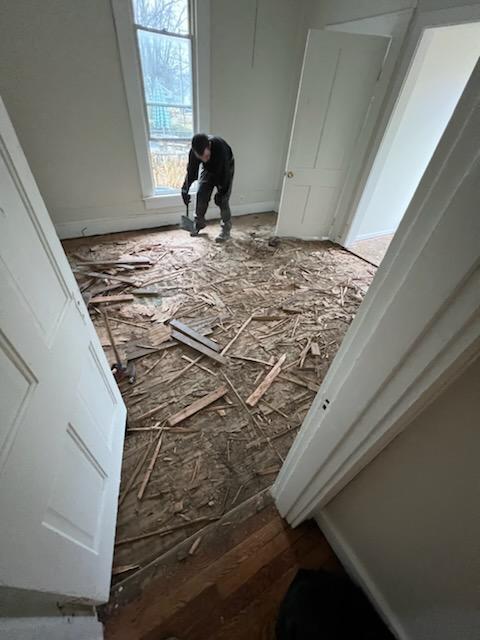 Old flooring torn out during demo