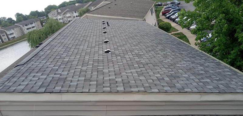 New architectural shingle roof on an apartment building