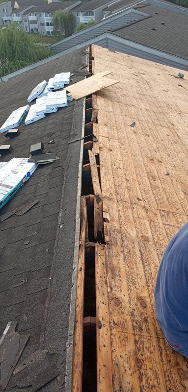 Old shingles torn off down to the roof deck