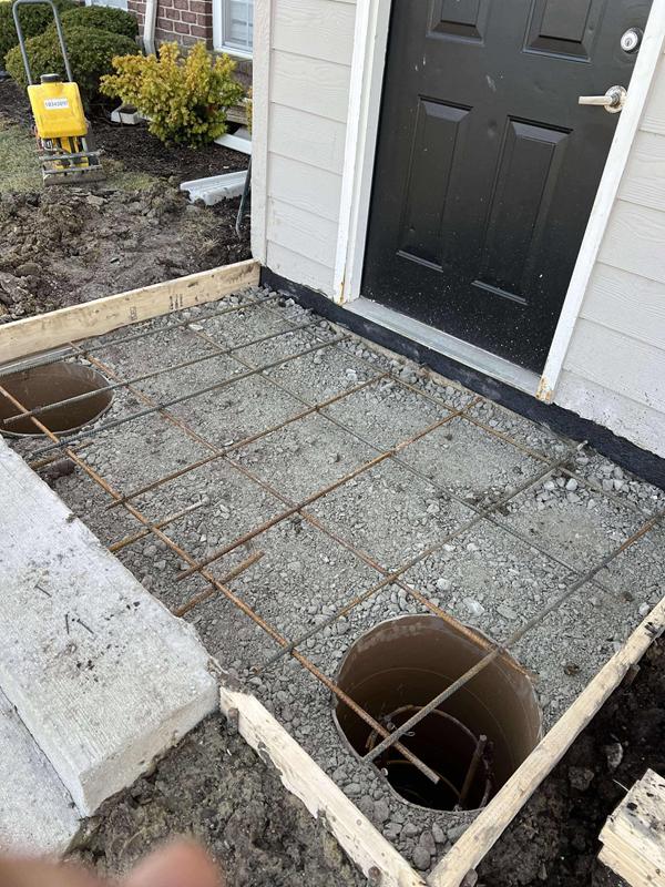 Forms and rebar set for a new concrete stoop