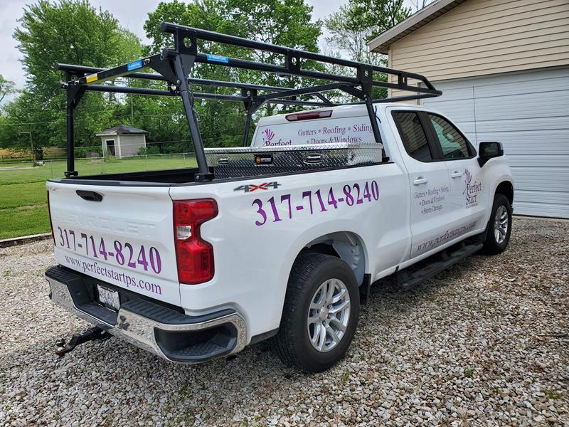 Truck tailgate showing the phone number 317-714-8240